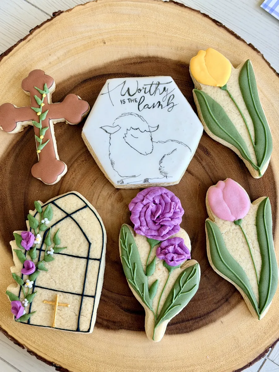 Easter cookies with a cross, Worthy is the Lamb lettering, stained glass window and tulips